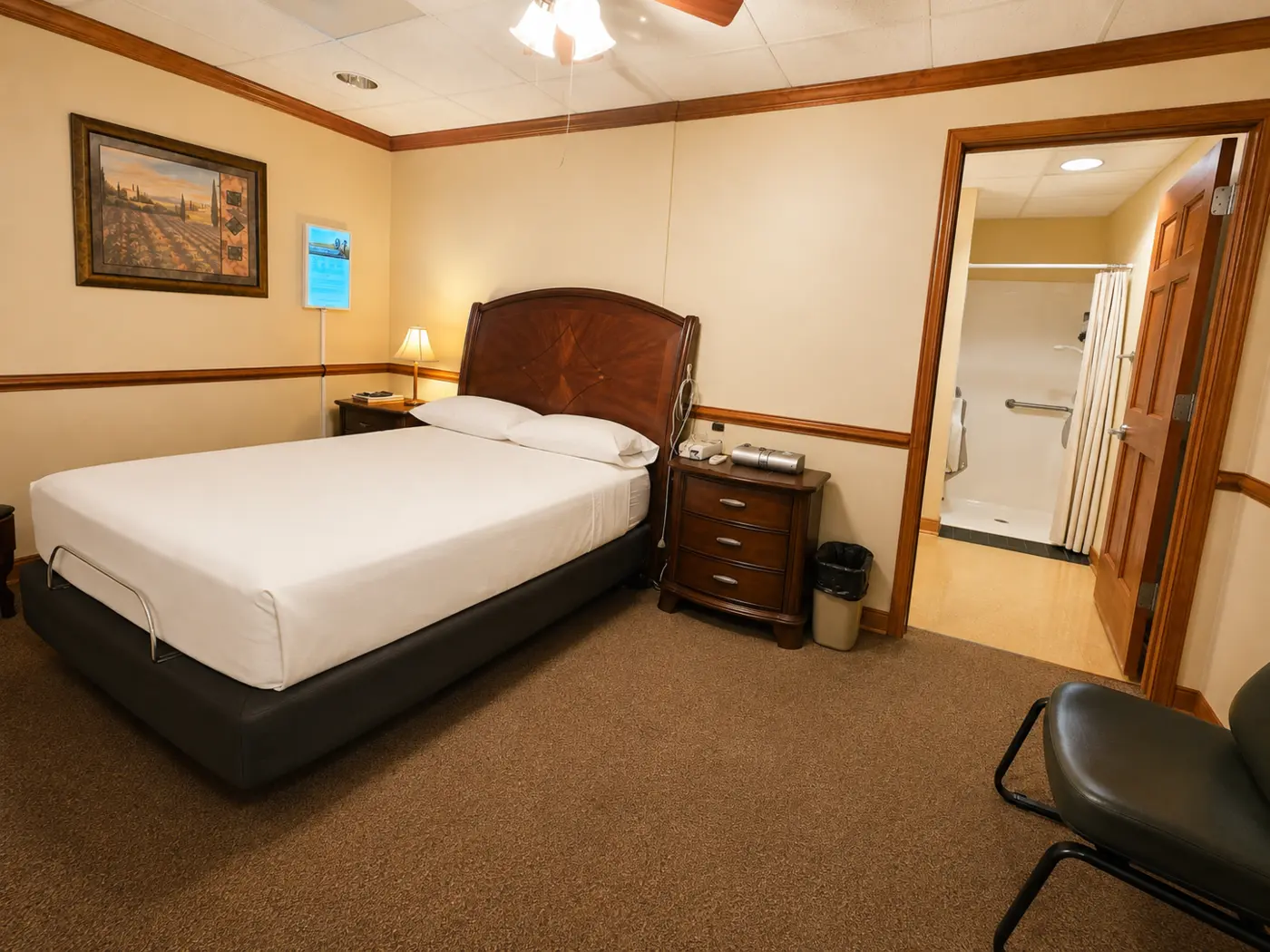 Private sleep room with bed and adjoining bathroom